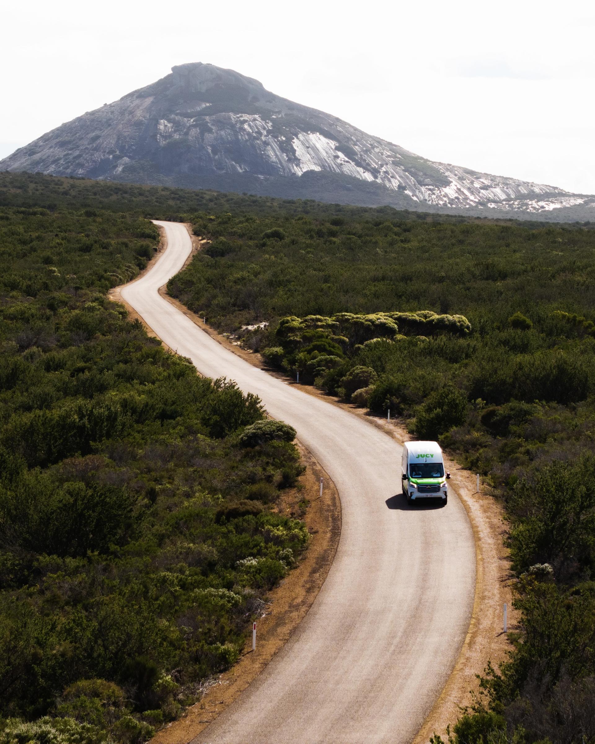 Campervan with hill in background